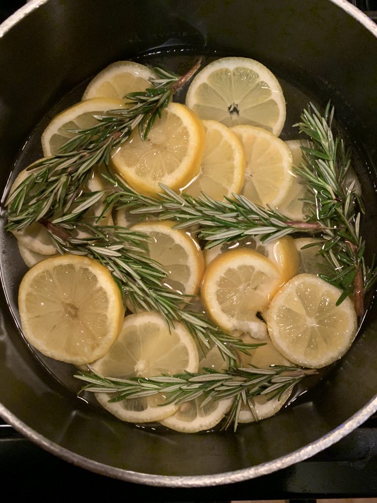 rosemary and lemon steeping in a pot