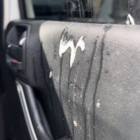 easy ways to protect car doors from dog scratches and drool